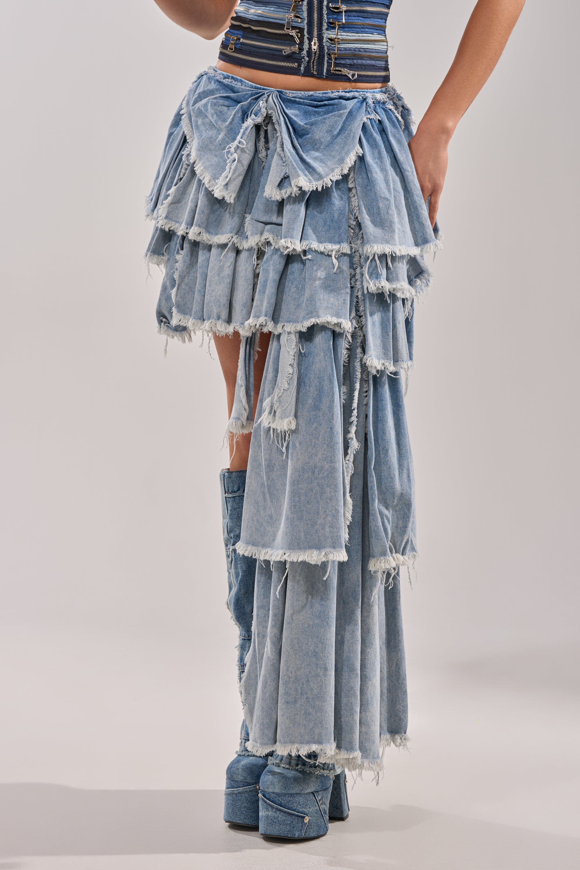 DISTRESSED TIERED ASYMMETRIC MIDI SKIRT