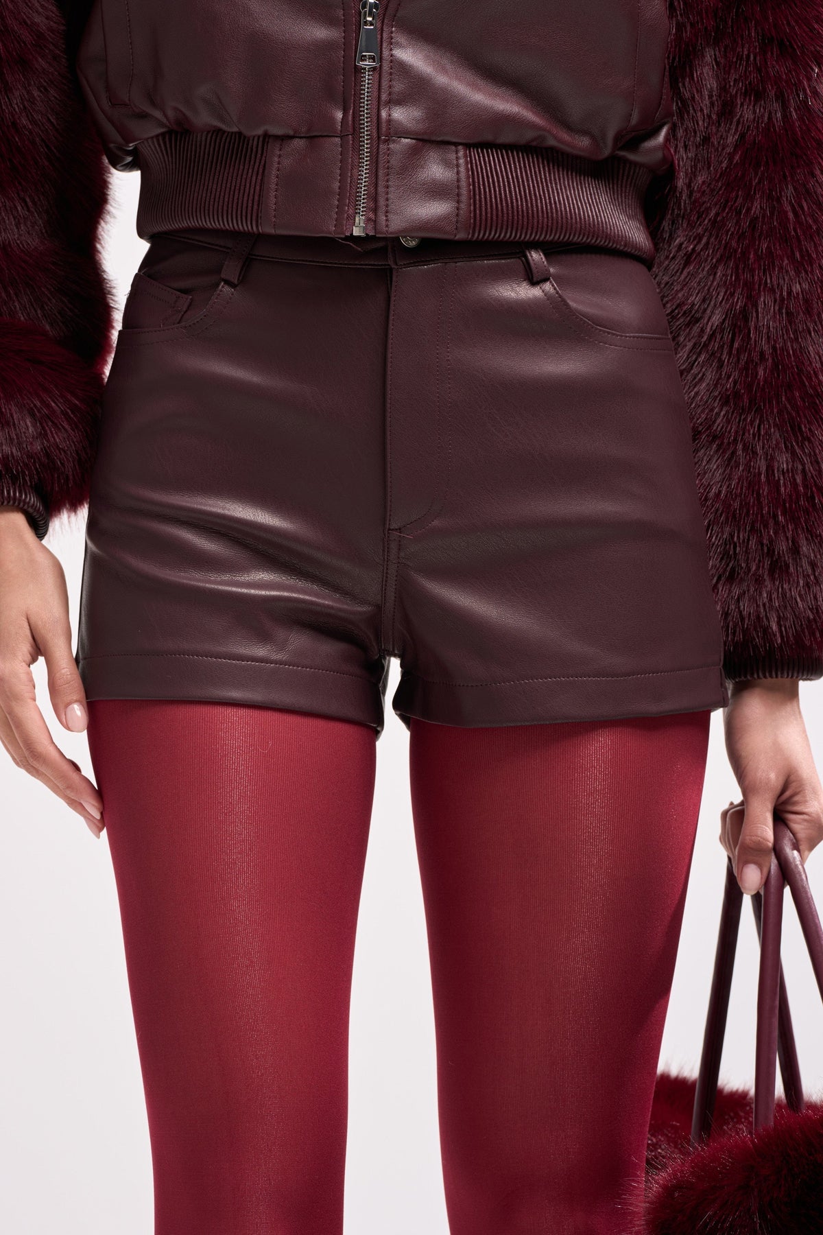 CALLIE FAUX LEATHER SHORT IN BURGUNDY
