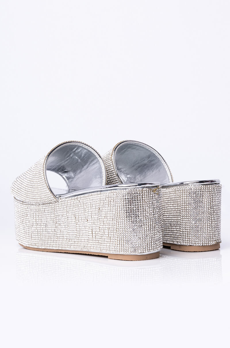 AND ANOTHER ONE SLIP ON FLATFORM SANDAL